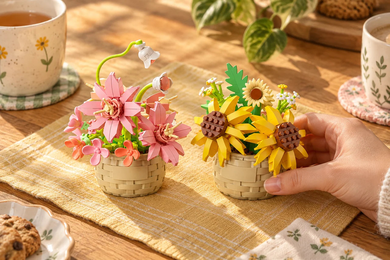 Two finished mini flower kits on a table.