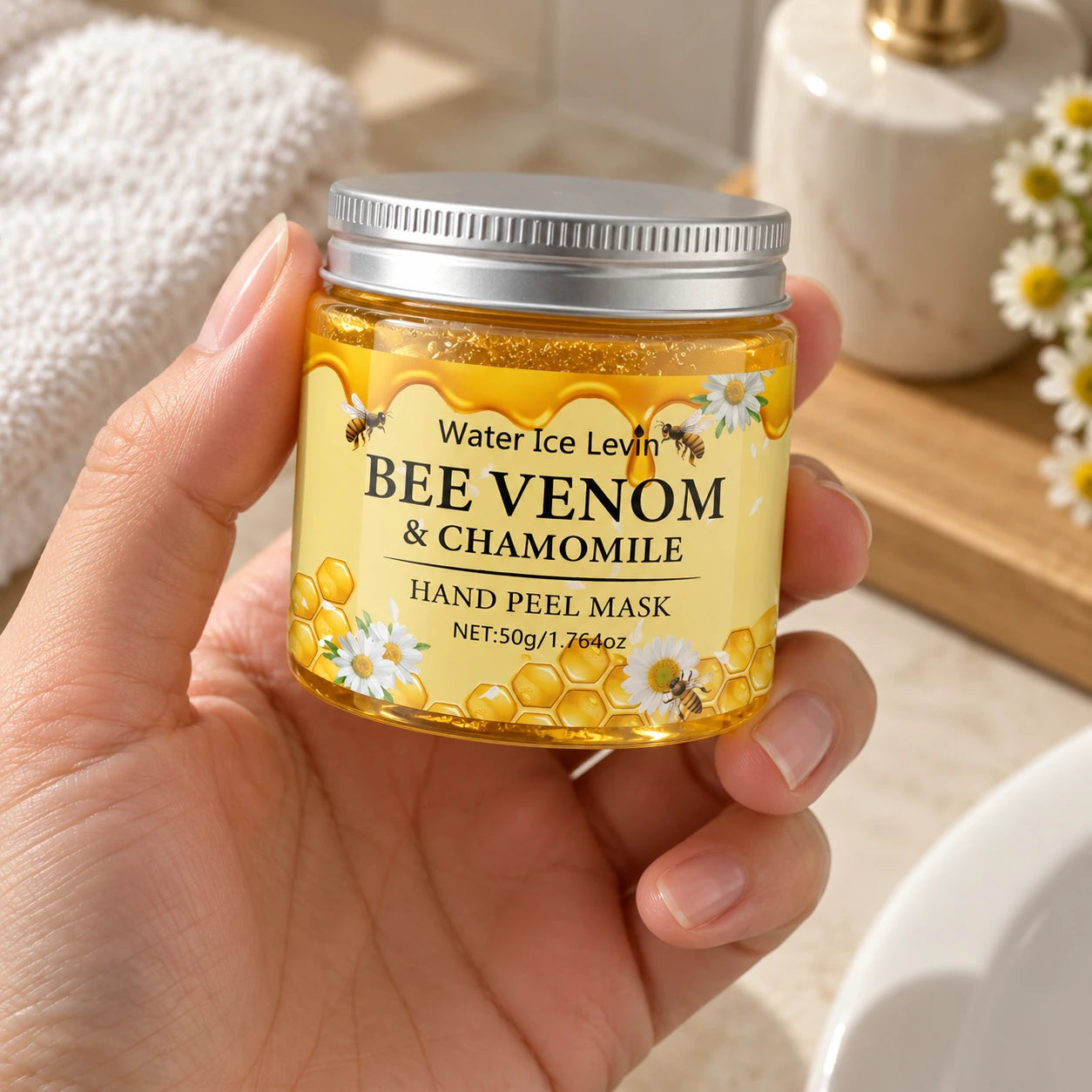 Honey Hour Hand Peel Mask - in an adult hand for scale