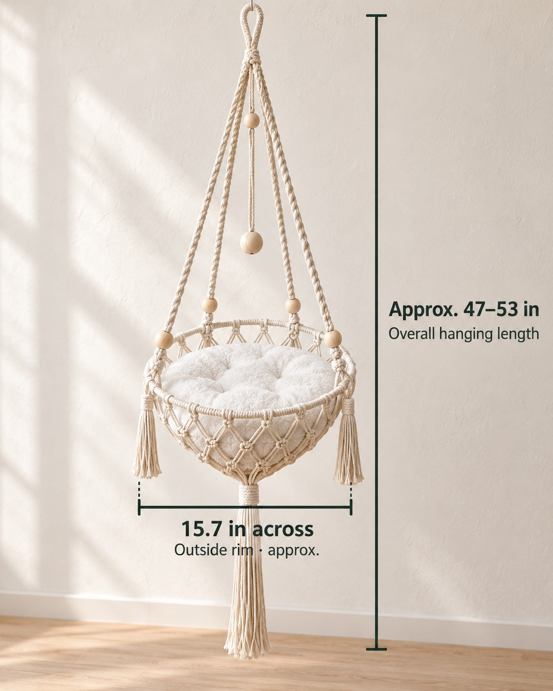 Photo size guide showing the complete cream hammock with one white cushion. Outside rim approximately 15.7 inches across; allow approximately 47 to 53 inches overall, including the bottom tassel. Hand-woven measurements are approximate.