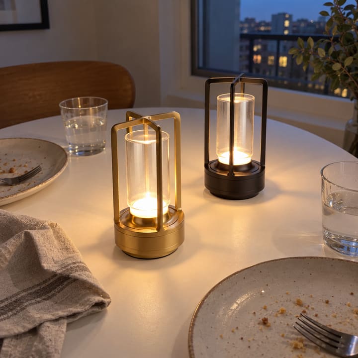 Customer photo: gold and black lanterns on a dining table, photographed from above.