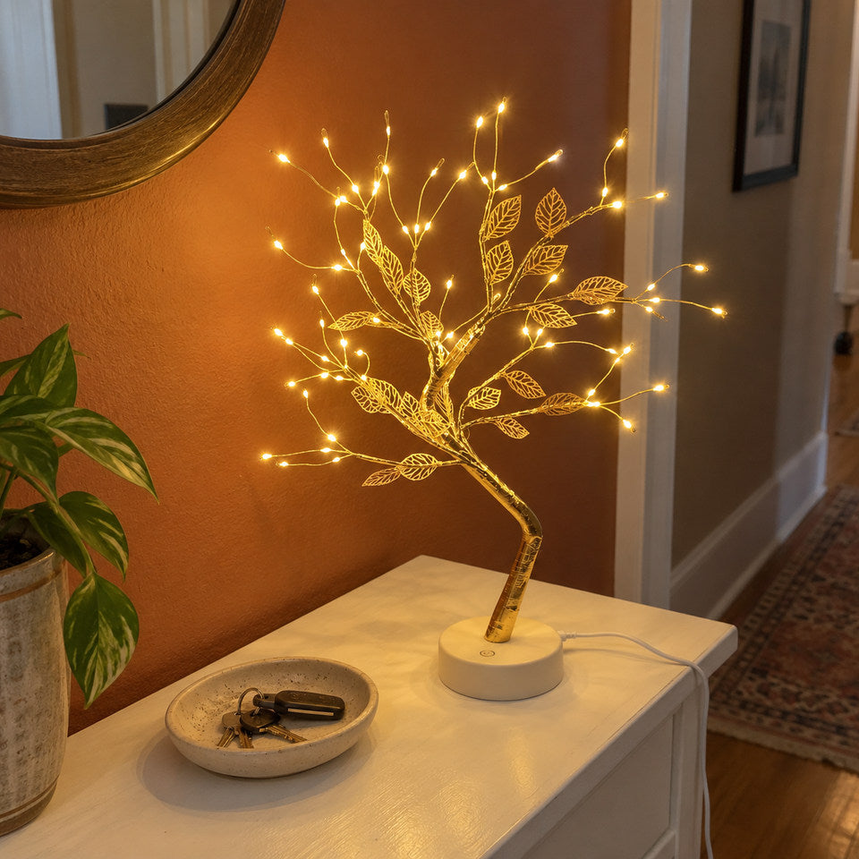 Only the Gold Leaf design from its own reference, on a simple white hallway console, terracotta wall, a small plain key dish.