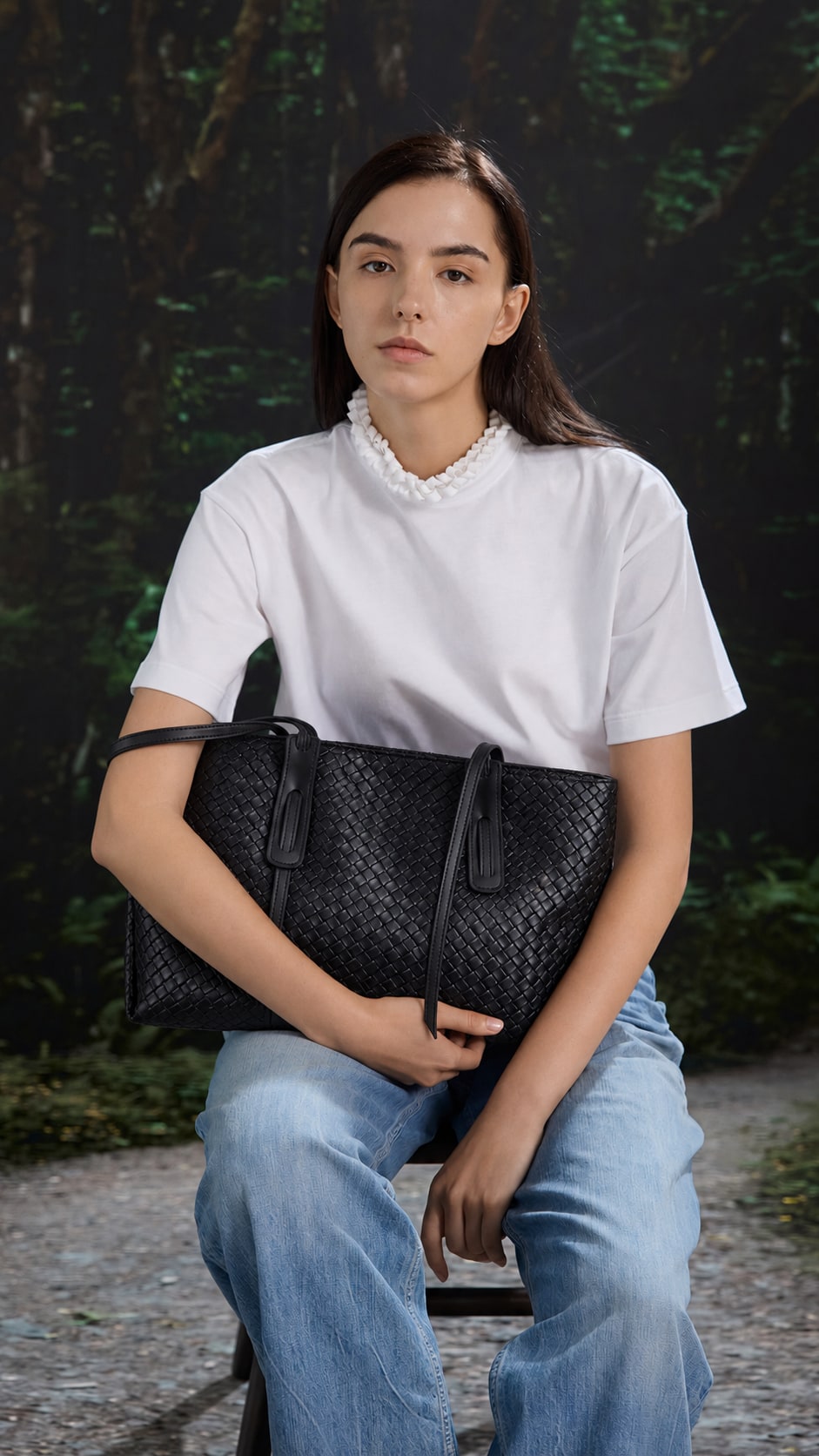Black woven tote styled with a casual outfit