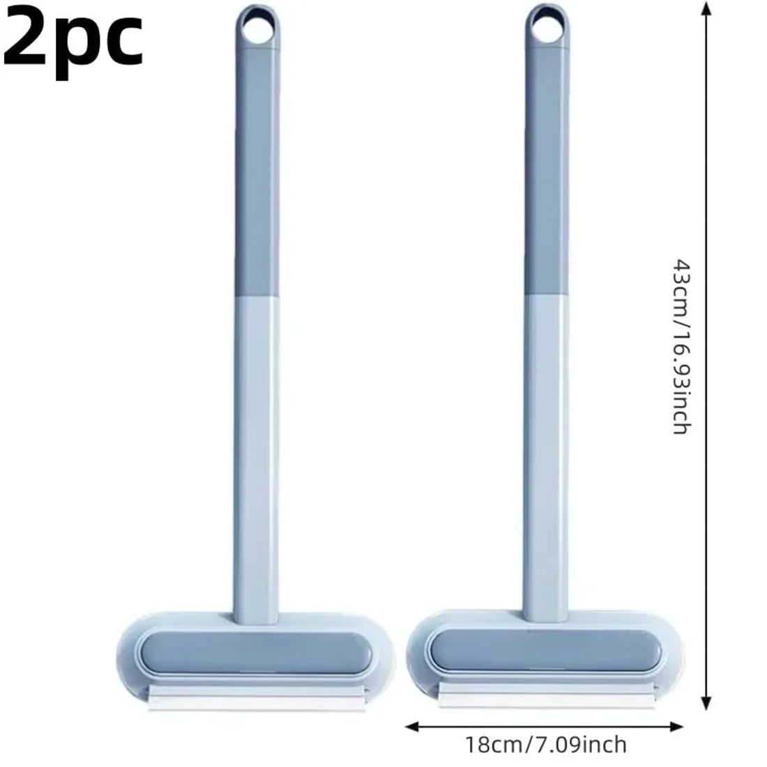 Photograph showing two brushes, each 43 cm long and 18 cm wide.