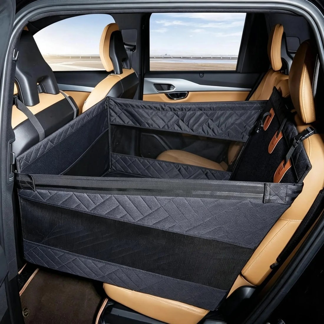 Black hard-base pet travel seat, mesh sides and rear pockets.