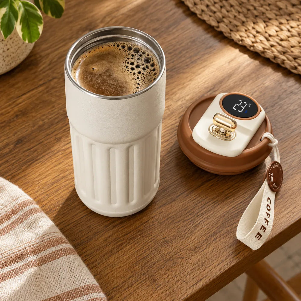 insulated coffee mug: everyday photograph.