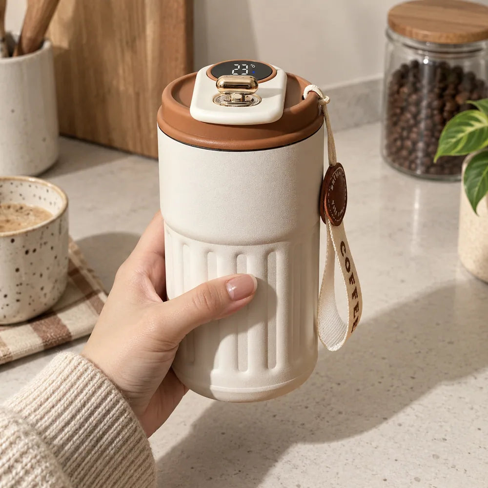 insulated coffee mug: everyday photograph.