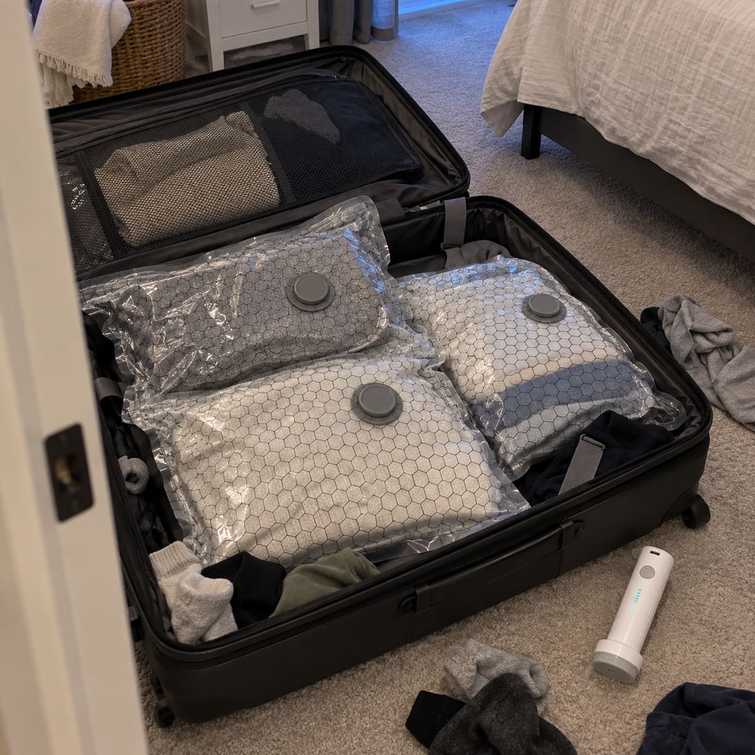 Compressed bags packed inside a large suitcase