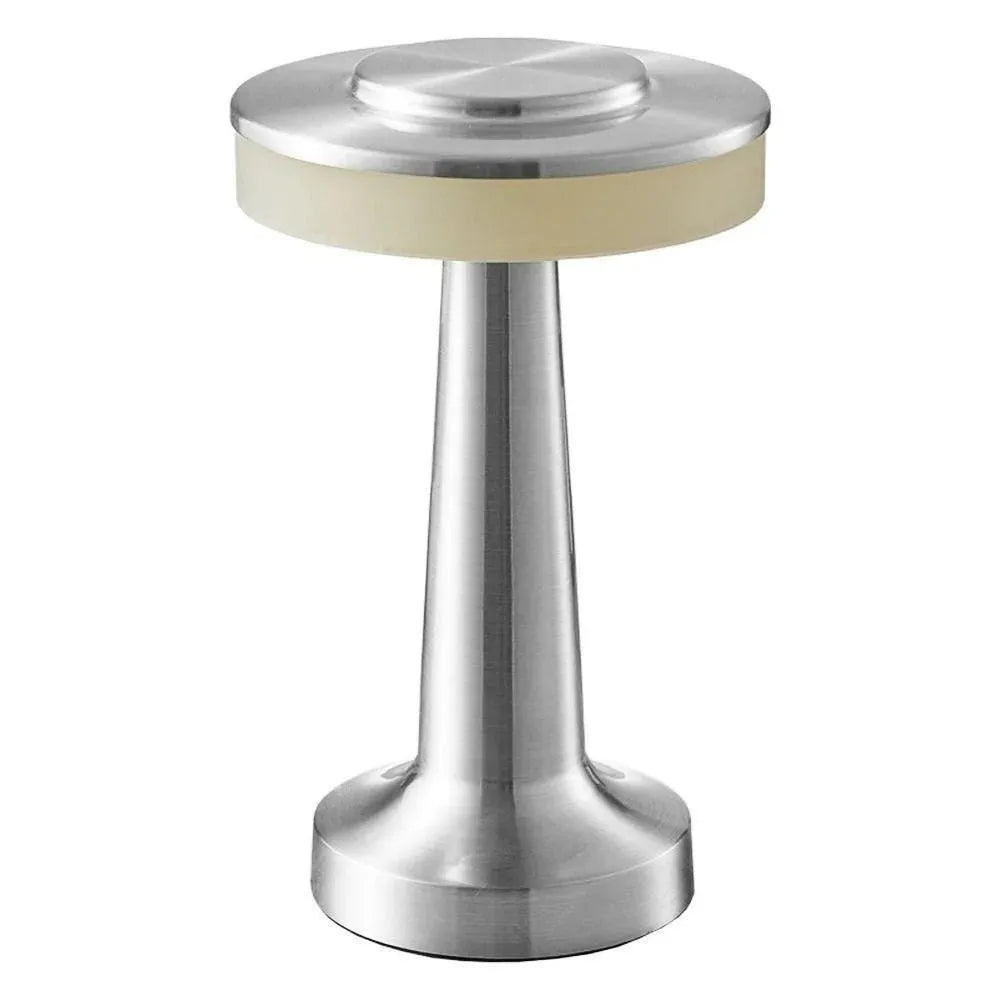 Product photograph of the silver C-style lamp.