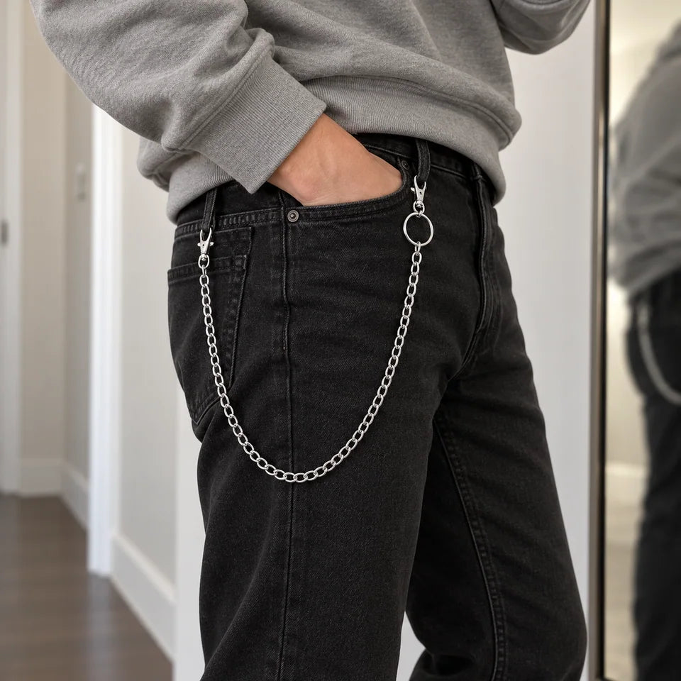 Single chain worn with black jeans and grey sweatshirt