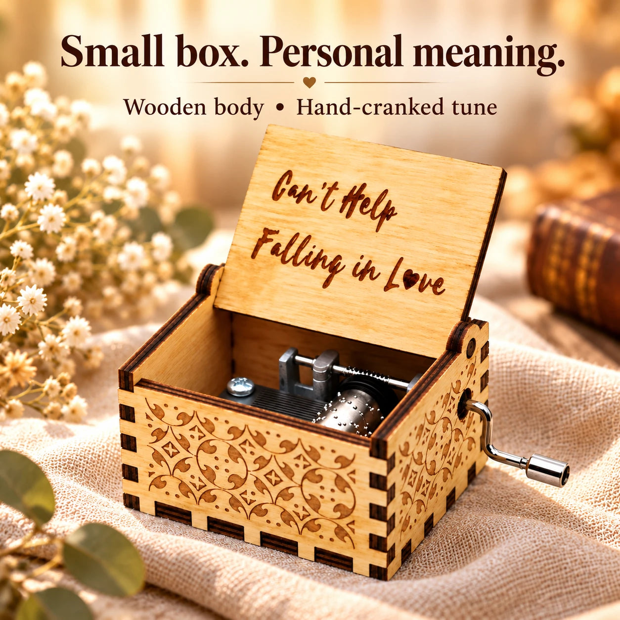 Wooden scroll details, dark interlocking edges and a manual side crank on the featured song box.