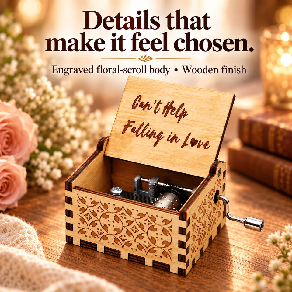 A closer look at the engraved floral-scroll wooden body.