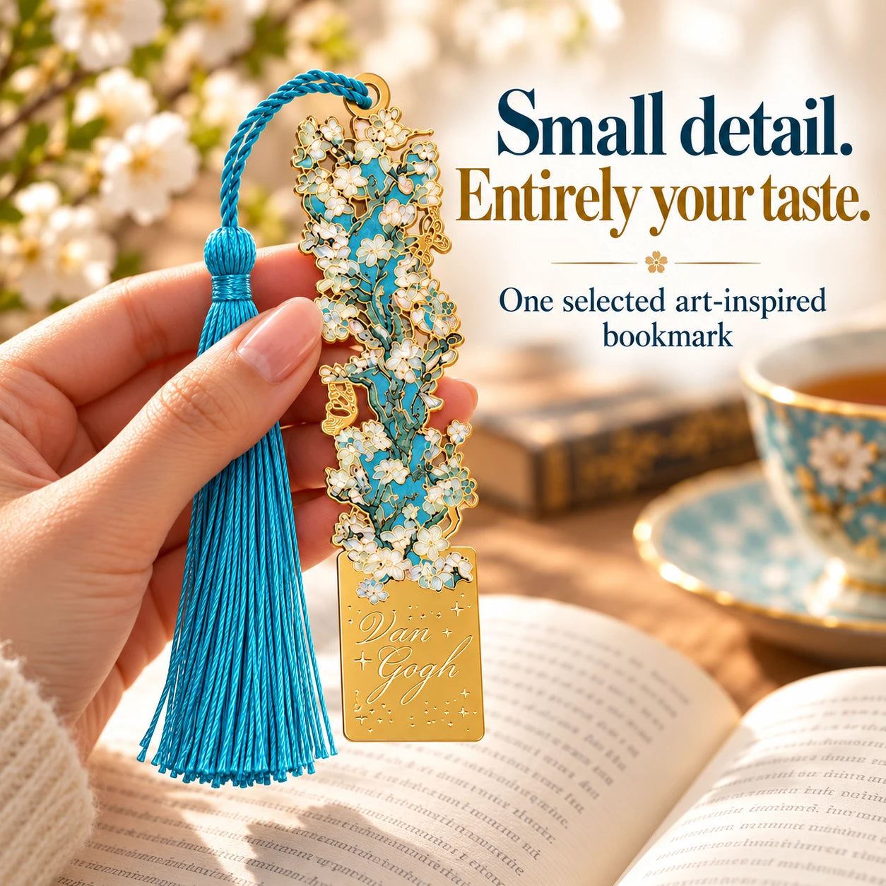 One selected blossom bookmark held by its lower plate for context; no measured size is claimed.