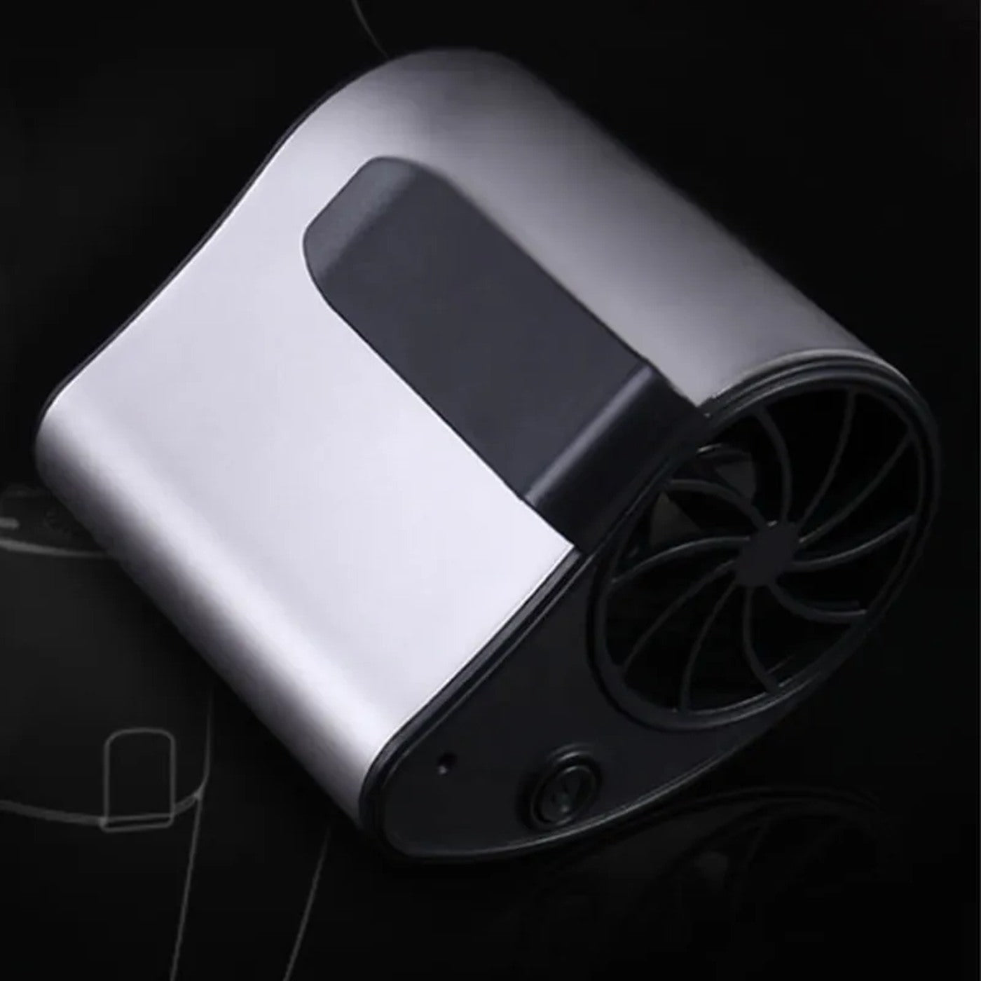 Silver waist fan showing the fan outlet, power control and outer clip