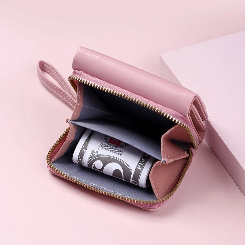 Photo of the open pink zip coin pocket